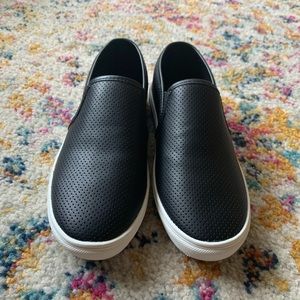 Black Steve Madden slip ons